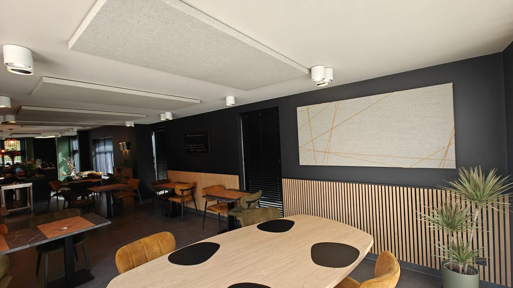 Meeting room with an acoustic panel with artistic cord wrapping